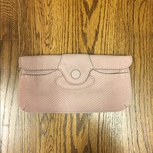 Little pink suede clutch